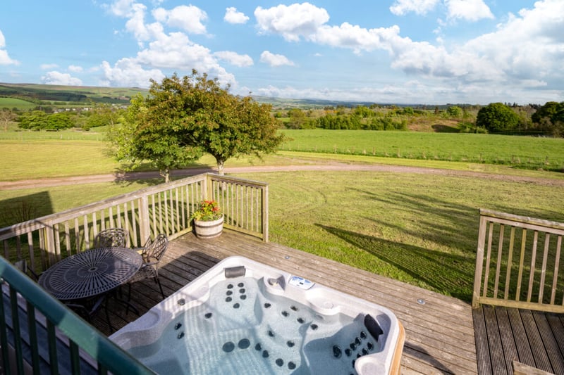 The hot tubs, decking and al fresco eating areas look out over the verdant Borders countryside.