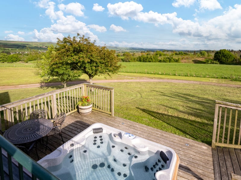 The hot tubs, decking and al fresco eating areas look out over the verdant Borders countryside.
