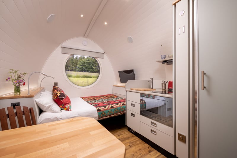 The pod interiors are gainfully equipped with toasty underfloor heating, mood lighting, a Smart TV and a kitchenette.