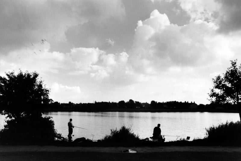 Two anglers at Yeadon Tarn in May 1994.