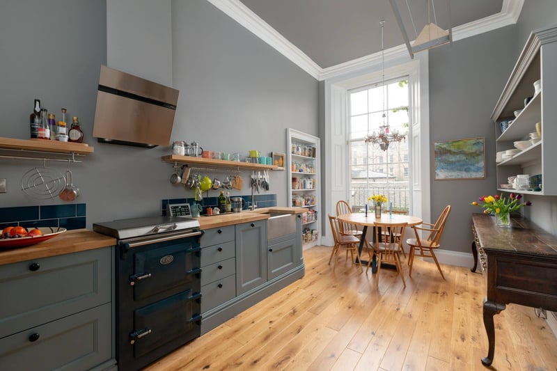 The generously proportioned dining kitchen with a range of floor standing and wall mounted units. Also included in the property is a handy utility room and a clothes pulley.