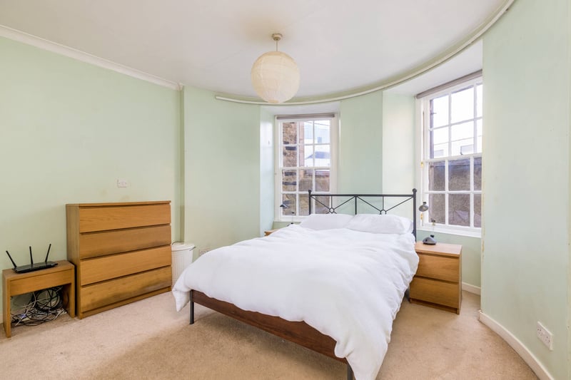 To the rear of the building are two well proportioned double bedrooms, both with fitted wardrobes. The master bedroom has a particularly noteworthy elegant curved wall.