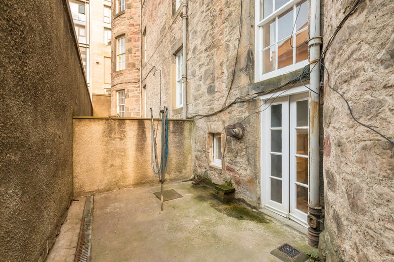 Externally, there is a cellar to the front of the building and a private patio area to the rear. There is also a lovely enclosed communal garden to the front of the property.