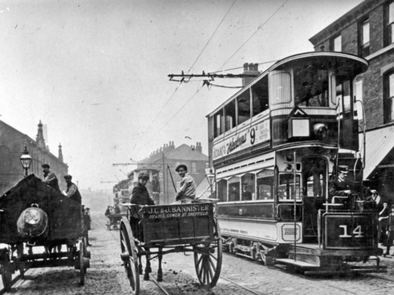A tram on Attercliffe Road, alongside a Corporation horse-drawn dustcart and J.C. and J. Bannister's butcher horse and cart, some time between 1900 and 1919