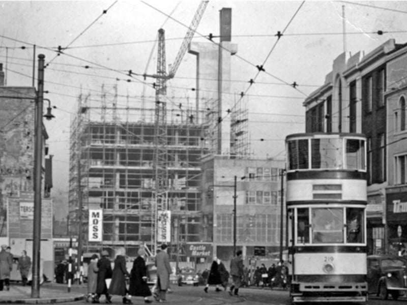The construction of Castle Market, with a tram in the foreground