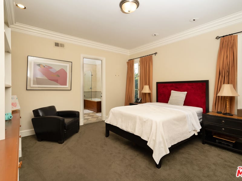 Another bedroom in the former home of the Menendez family, once again with an en suite bathroom to prevent queues on weekday mornings (Credit: The MLS)