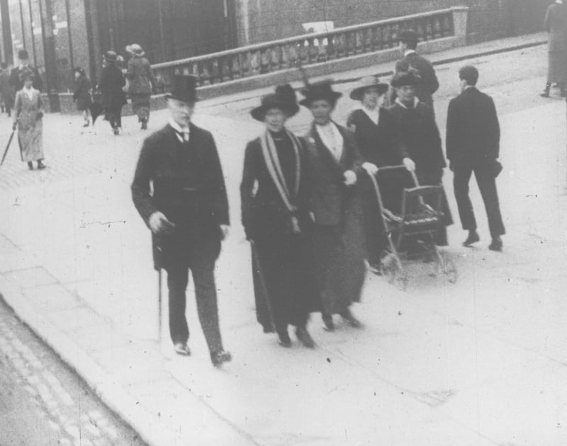Great Western Road seen through still from the film 'Glasgow 1910' - pictured are some West Enders wearing their Sunday best.