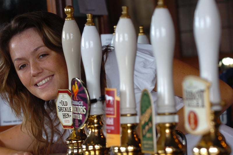 Laura Smith was enjoying her time behind the bar in this scene from August 2007.