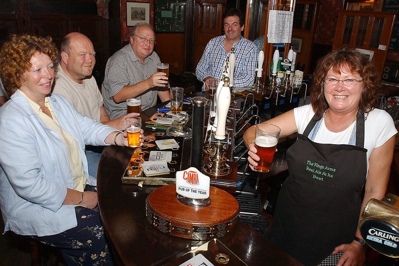 Pub owner Daryl Frankland, barmaid Lucy Young and regulars Alison and Peter Bedinfiels and Fred Readman, were in the picture in 2006.