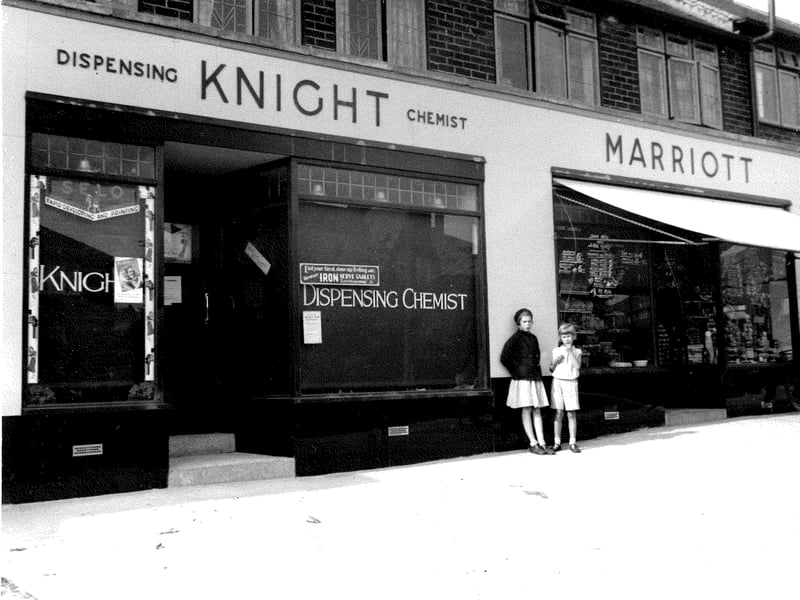 Vesper Road in September 1937. On the left number 69, Miss Mary Knight dispensing chemist, right number 71, Charles Marriot grocer, has a shop.