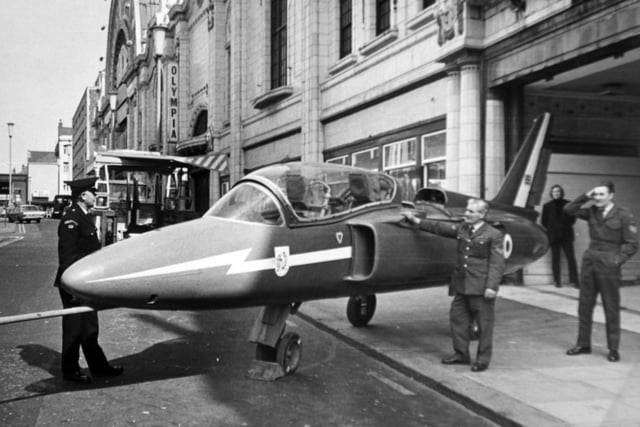 One of the Red Arrows Gnat fighters nearly gets a parking ticket outside the Winter Gardens in Blackpool, for the Outdoor Leisure Show in 1973