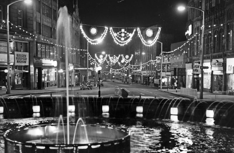 Sheffield lit up for Christmas 1970, with the Goodwin Fountain, at the top of Fargate, in the foreground