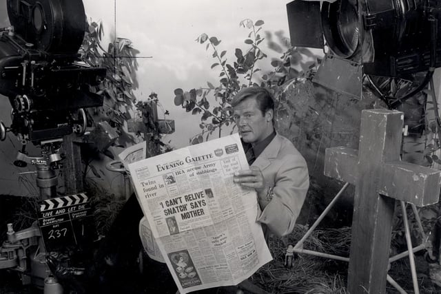 Roger Moore reading the Evening Gazette