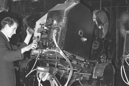 This projectionist made sure the latest film was in place for showing at the Havelock Cinema in 1938.