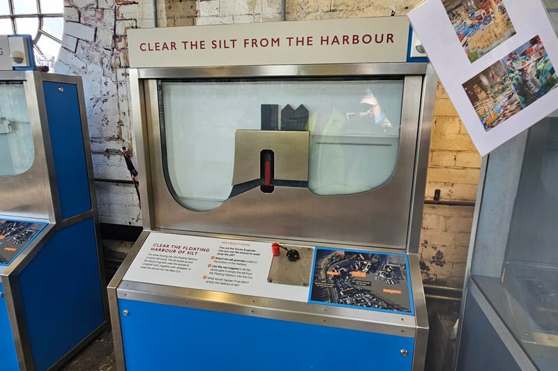 One of three interactive magnet games on the site. The installation explains how silt (mud) is removed with help from the sluices.