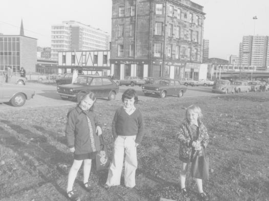 Back in the day hand me downs were a lot more common, and you were expected to 'grow into' your clothes. Pictured here are a group of siblings (one wearing some very era-appropriate trousers) down the Shandon off Argyle Street