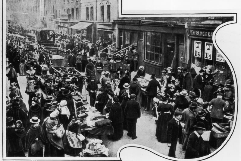 Shoppers at the clothes market in Brick Lane in around 1900. 