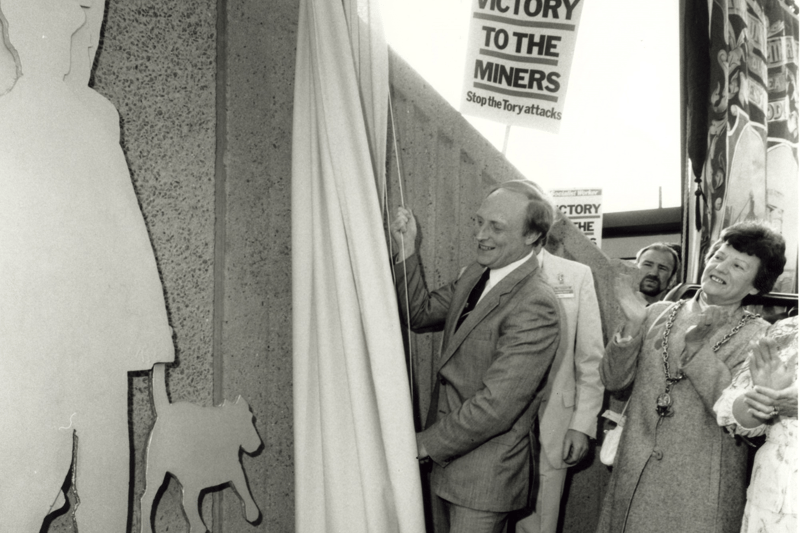 The then Labour Party leader Neil Kinnock, unveiling artwork depicting the Jarrow Crusade at Jarrow Metro Station in 1984. Nexus believe that the photo was taken at the height of the miners' strike.