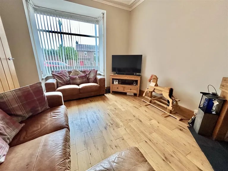 A large window overlooking the front elevation lets in lots of natural light.