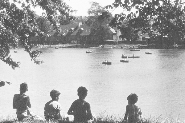A group of boys spend a lazy afternoon at Bingham's Pond watching the boats drift across the water