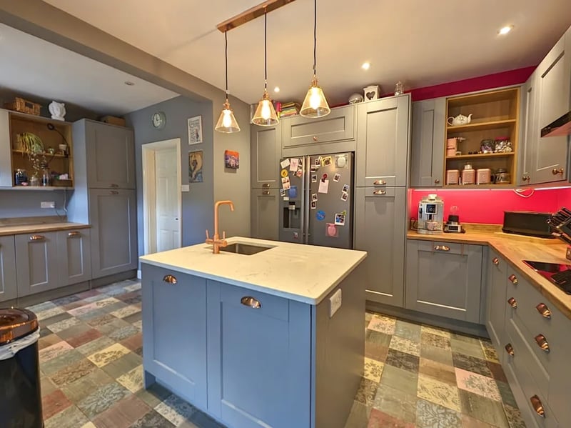 The kitchen is one of the many areas of this home which has benefitted from improvements made by the current owner.