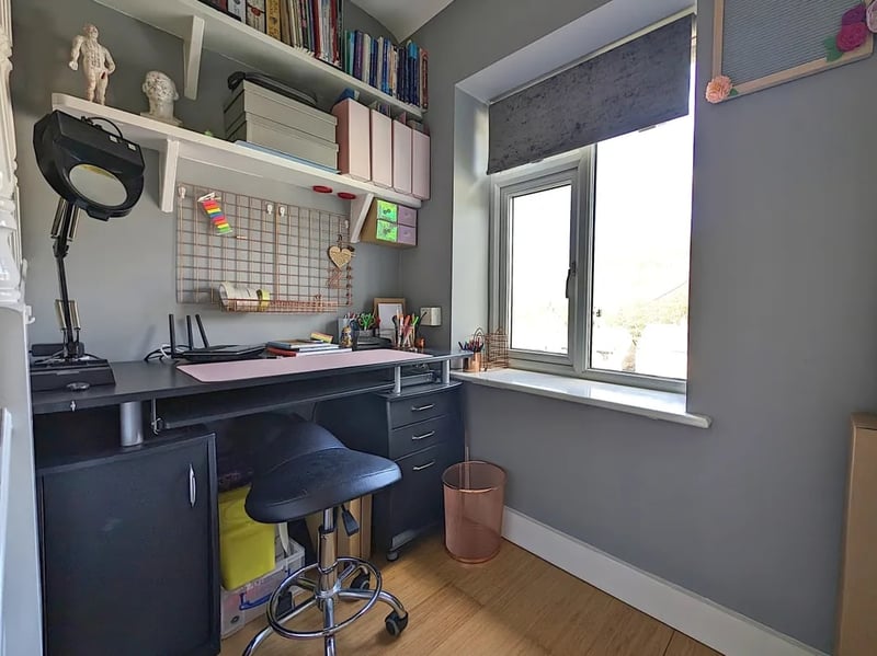 Part of the first floor landing has been converted to a home office space.
