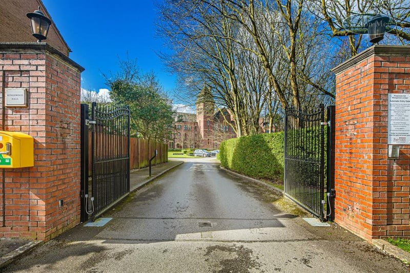 The gated driveway provides a good first impression and added security.