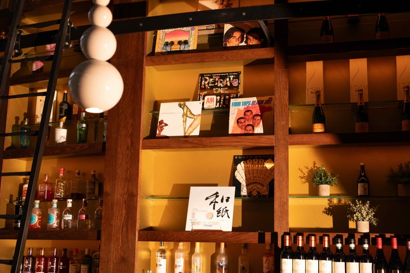 Originating from 1950s Japan, the listening bar concept blends dining with audiophile-grade music listening. These venues, which emerged in Tokyo's small bars, cafes, and record stores, serve as a hub for music lovers seeking a relaxed environment to appreciate high-fidelity sound.