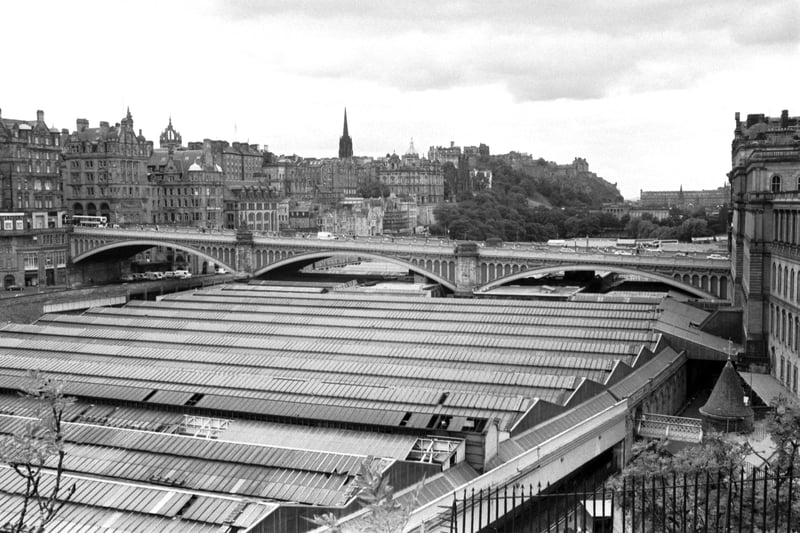 A view of the roof of Waverley Station, showing the railway station's missing glass panels in June 1989. The picture also shows Waverley Bridge, Edinburgh Castle and the Old Town skyline.