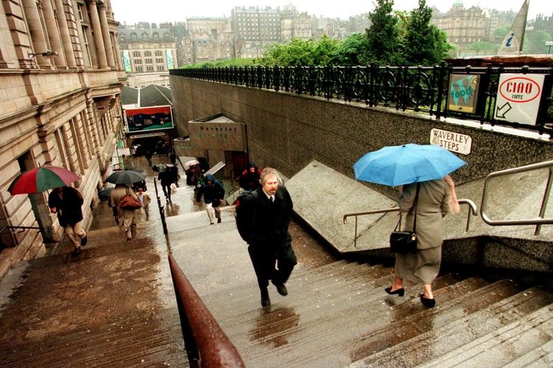 Waverley steps pictured in May 1997, long before reconstruction work in 2012, with the route from Princes Street down to the station's platforms notorious as a proper wind tunnel at times.