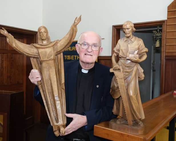 Father William Kilgannon, at the Mother of God Catholic church on Abbeydale Road with the statues returned after they were stolen recently, Photo: Dean Atkins, National World