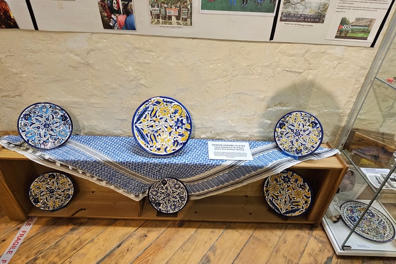 A selection of Hebron ceramic plates hand-painted at Al Salam glass and pottery factory.