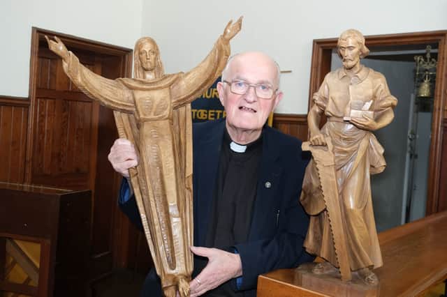 Father William Kilgannon at the Mother of God Catholic church on Abbeydale Road with the religious sculptures that have been returned. Picture: Dean Atkins, National World