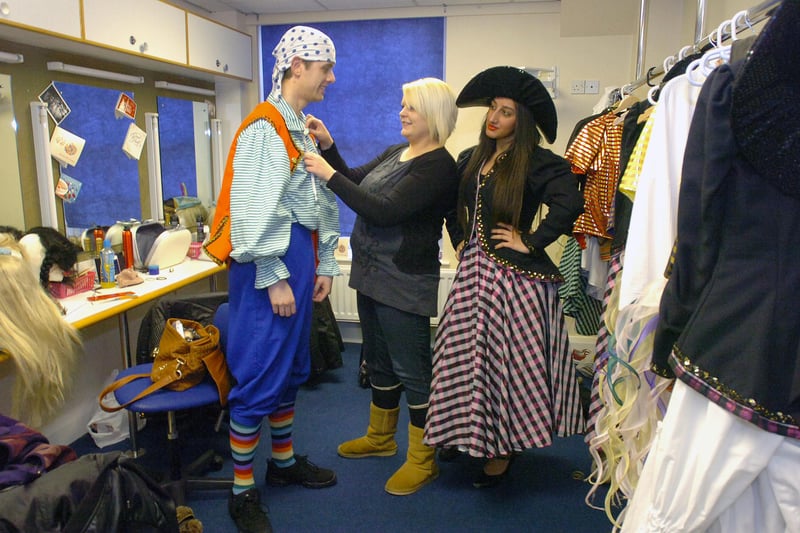 Angela Donkin was making adjustments to the costume of dancer Matthew Cressey in this Empire Theatre photo from 2012 when Peter Pan was the panto.
Watching on is Sophia Afzal.