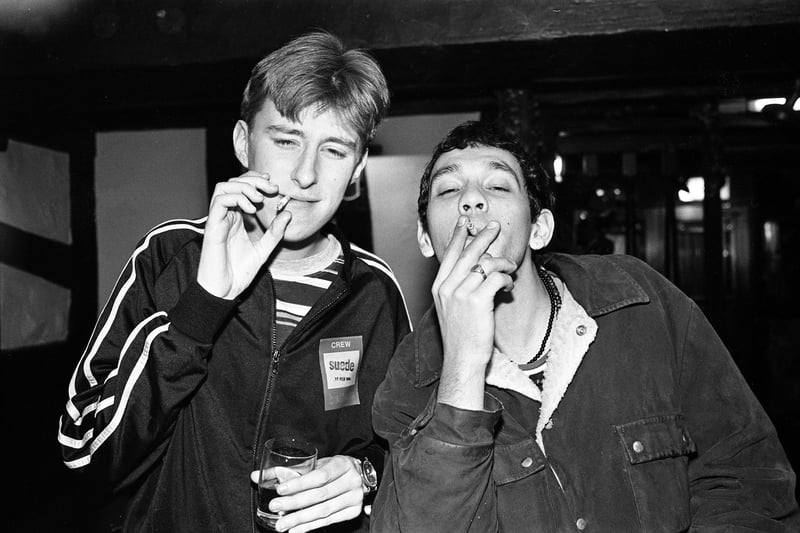 Music writer John Harris and Rick Witter of Shed 7 smoking cigarettes, Blackpool, United Kingdom, 11th February 1994. Harris later wrote the book 'The Last Party' about the Britpop era of British music