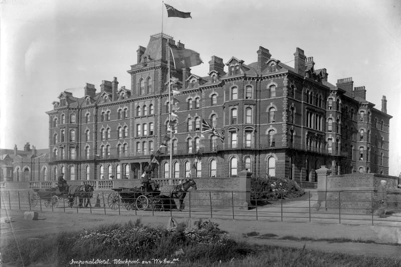 Imperial Hotel, Blackpool, Lancashire, 1890-1910. The Imperial Hotel on a windy day with two horse-drawn carriages parked outside awaiting fares. The hotel was built in 1867-1868 by Clegg and Jones at a cost of £50,000