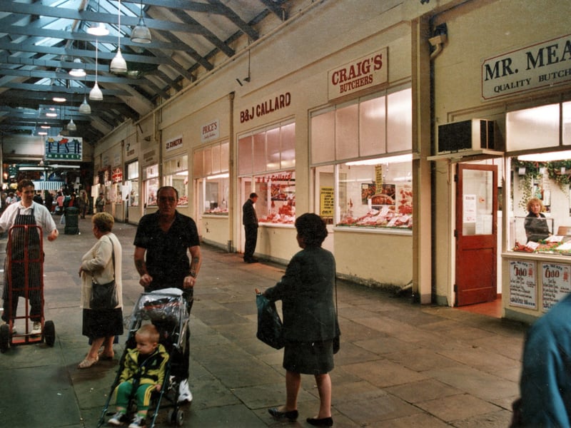 This photo from September 1999 shows some of the 20 plus shops contained within Butchers Row. Prices, B.& J. Ballards, Craigs and Mr. Meats shops are prominent in this photo.