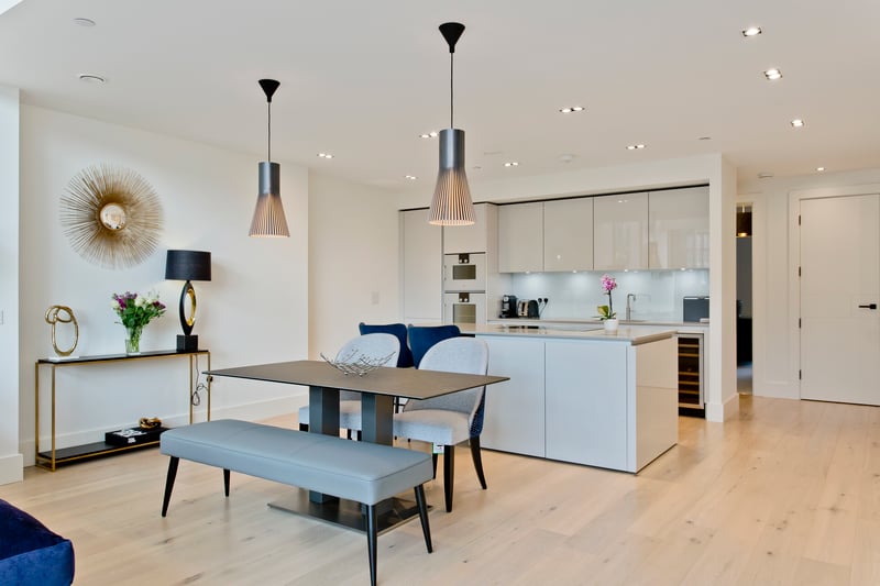 The spacious and modern kitchen also has an area for dining.