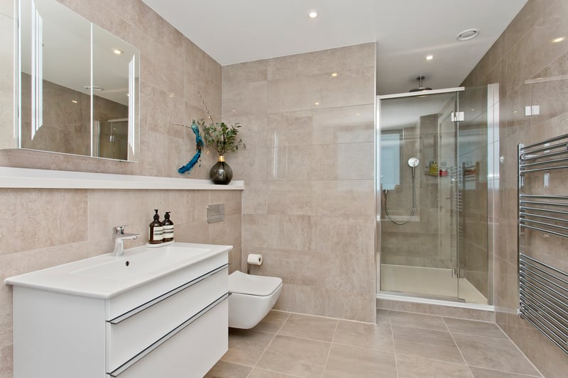 The ensuite is fitted with a four piece suite and has the luxury of both a bath and a shower.