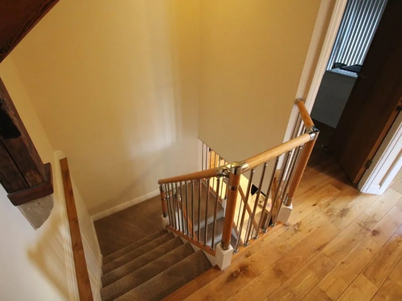The stairs are centrally positioned for easy access to every first floor room.