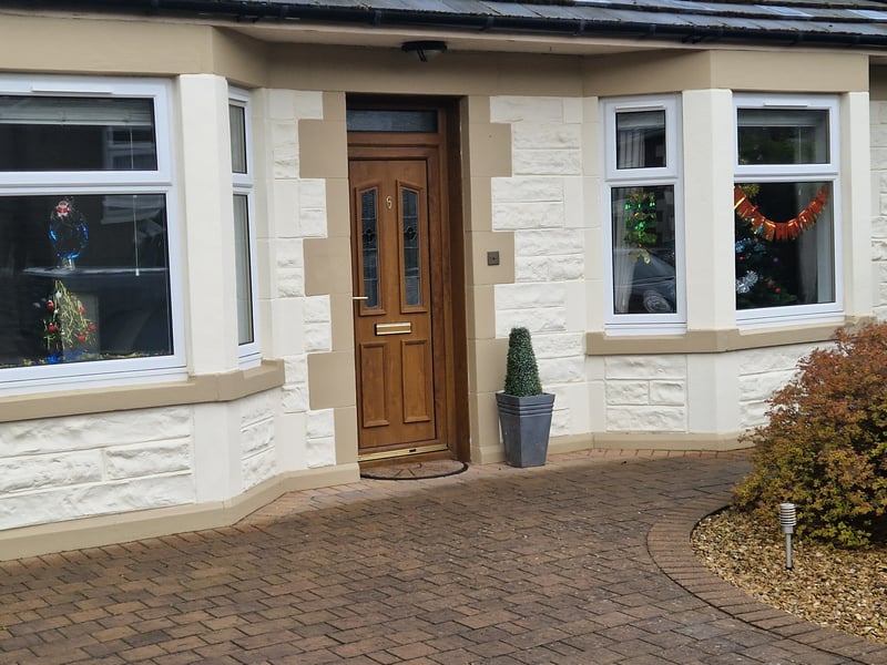 The film crew placed Christmas decorations in the windows of homes on the Longstone street.