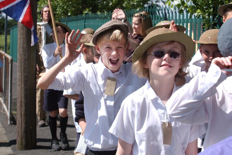 They sang as they went. That's the children of West Rainton Primary School who dressed as Second World War evacuees and sang songs from the era in a 2005 project.