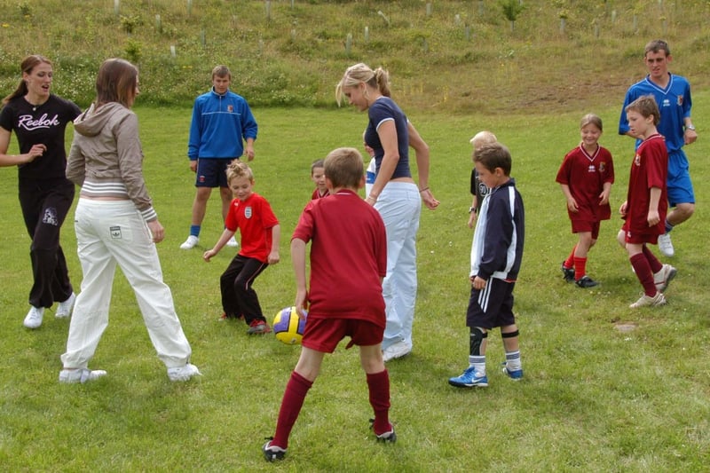 Steph joined Jill Scott and Carly Telford for a kickaround with local youngsters at Dalton Park in 2007.