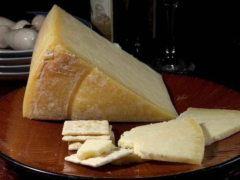 Lancashire is an English cow's-milk cheese. There are three distinct varieties of Lancashire cheese. Young Creamy Lancashire and mature Tasty Lancashire are produced by a traditional method, whereas Crumbly Lancashire is a more recent creation suitable for mass production.