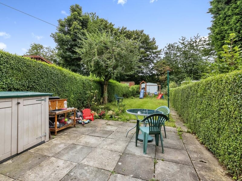 The generous sized rear garden comprises of a patio, a large grassed area and an extensive outbuilding with mains lights and electrics.