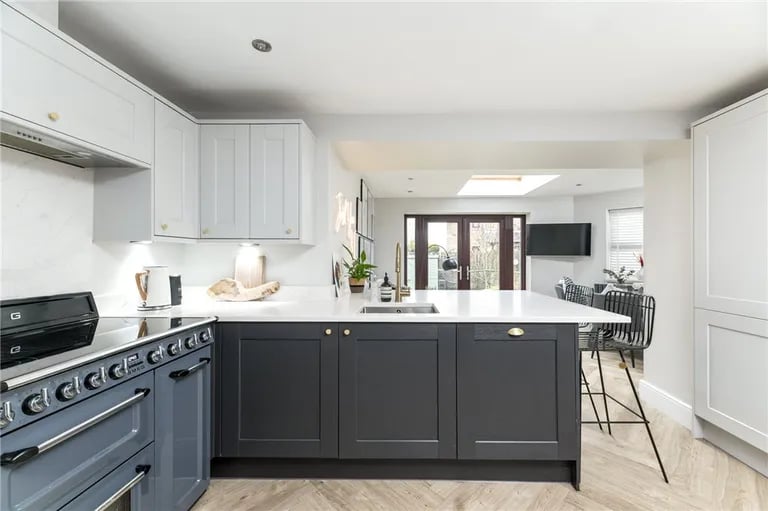 The kitchen area has a number of fitted base and wall units and complimentary worktops along with a number of Smeg appliances.