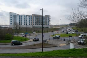 New photos show the unfinished Marriott hotel looming eerily over the busy Morrisons roundabout in Waverley.