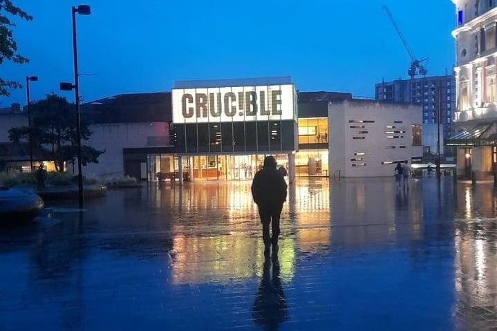 Caroline Wibberley shared this moody photo of The Crucible Theatre looking quite cozy on a rainy day on Crucible Square.