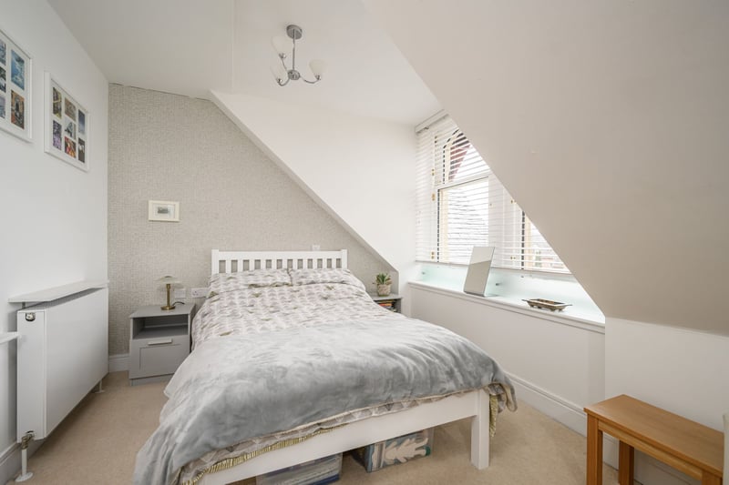 There is a second double bedroom enjoying views to the south with generous built-in wardrobe space.