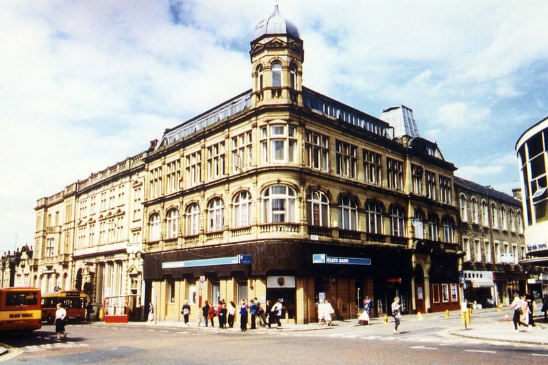 The 1899 building of the Morley Industrial Co-operative Society, now occupied by Barclays Bank, at the junction of Queen Street and Albion Street. Just visible on the right is part of the 1957 Co-op building, known as Society House. Pictured in February 1995.